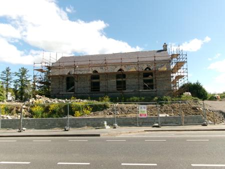 stone building with scaffolding