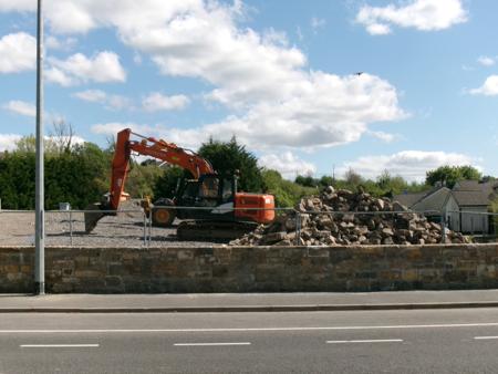 digger next to stones