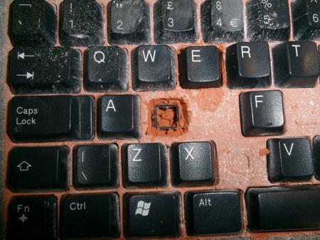 digging a cavity in sand on a keyboard