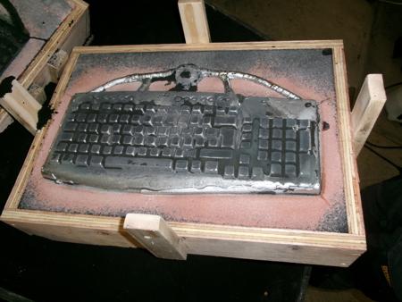 sand-cast keyboard in box