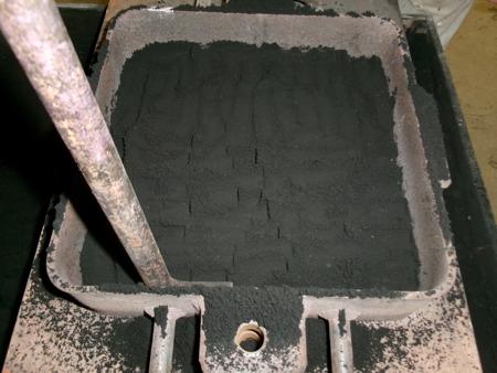 compacting sand in corners