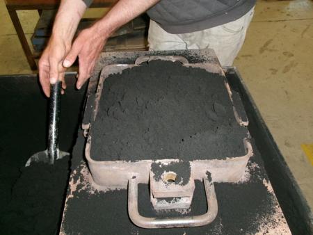 filling box with shovelled sand