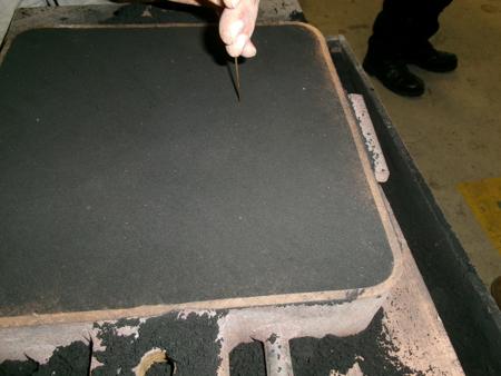 poking holes in sand