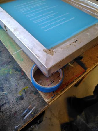 roll of tape under silkscreen